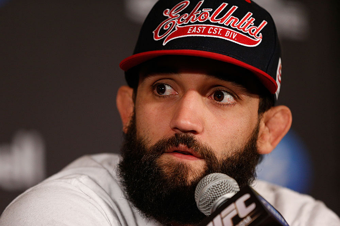 MONTREAL, QC - MARCH 14:  Johny Hendricks interacts with media during the final press conference ahead of his UFC 158 bout at Bell Centre on March 14, 2013 in Montreal, Quebec, Canada.  (Photo by Josh Hedges/Zuffa LLC/Zuffa LLC via Getty Images)