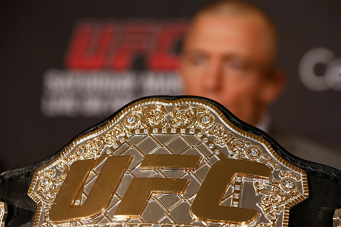 MONTREAL, QC - MARCH 14:  Georges St-Pierre interacts with media during the final press conference ahead of his UFC 158 bout at Bell Centre on March 14, 2013 in Montreal, Quebec, Canada.  (Photo by Josh Hedges/Zuffa LLC/Zuffa LLC via Getty Images)