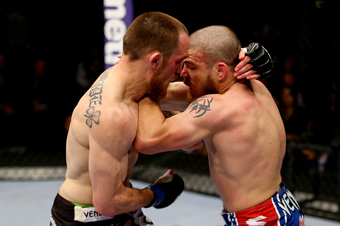 NEWARK, NJ - APRIL 27:  Pat Healy (L) battles against Jim Miller (R) in their lightweight bout during the UFC 159 event at the Prudential Center on April 27, 2013 in Newark, New Jersey.  (Photo by Al Bello/Zuffa LLC/Zuffa LLC Via Getty Images)