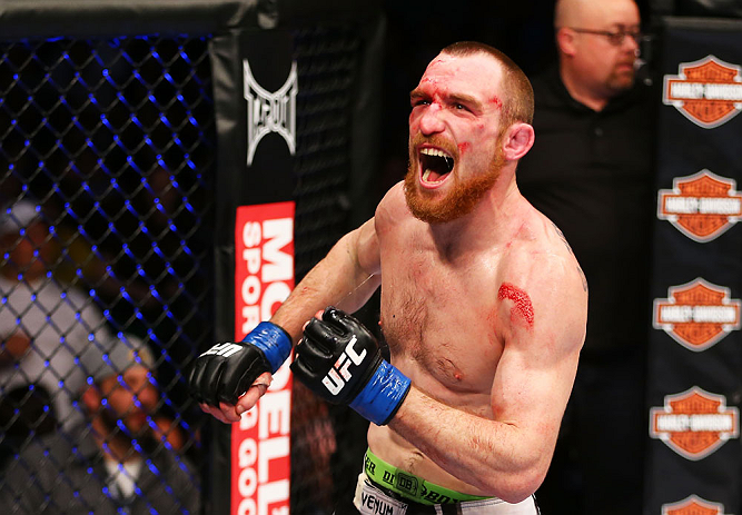 NEWARK, NJ - APRIL 27:  Pat Healy celebrates defeating Jim Miller by Technical Submission (Rear-Naked Choke) in their lightweight bout during the UFC 159 event at the Prudential Center on April 27, 2013 in Newark, New Jersey.  (Photo by Al Bello/Zuffa LLC/Zuffa LLC Via Getty Images)
