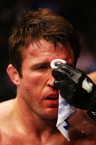 NEWARK, NJ - APRIL 27: Chael Sonnen is tended to after losing to Jon Jones by knockout in their light heavyweight championship bout during the UFC 159 event at the Prudential Center on April 27, 2013 in Newark, New Jersey.  (Photo by Al Bello/Zuffa LLC/Zuffa LLC Via Getty Images)