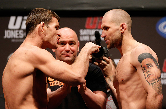 NEWARK, NJ - APRIL 26:   (L-R) Opponents Michael Bisping and Alan Belcher face off during the UFC 159 weigh-in event at the Prudential Center on April 26, 2013 in Newark, New Jersey.  (Photo by Josh Hedges/Zuffa LLC/Zuffa LLC via Getty Images)