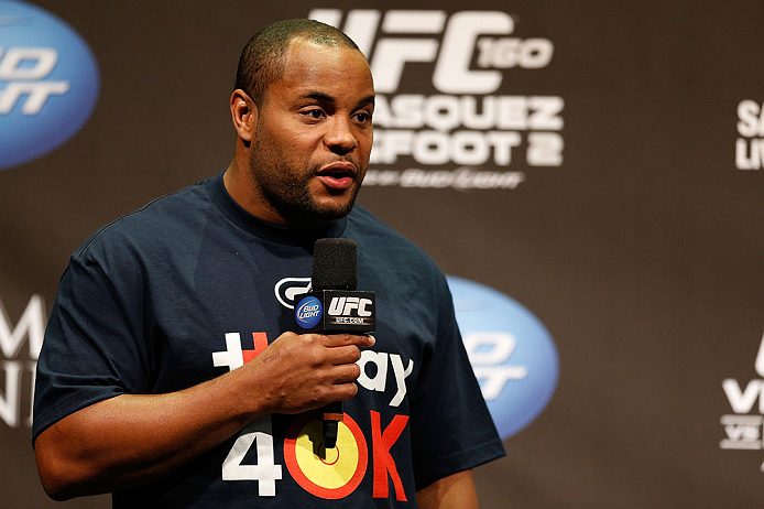 LAS VEGAS, NV - MAY 24: UFC heavyweight contender and former Oklahoma State and Olympic wrestling standout Daniel Cormier interacts with fans during a Q&A session before the UFC 160 weigh-in at the MGM Grand Garden Arena on May 24, 2013 in Las Vegas, Nevada. (Photo by Josh Hedges/Zuffa LLC/Zuffa LLC via Getty Images)