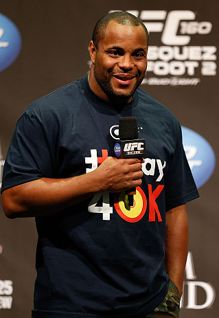 LAS VEGAS, NV - MAY 24: UFC heavyweight contender and former Oklahoma State and Olympic wrestling standout Daniel Cormier interacts with fans during a Q&A session before the UFC 160 weigh-in at the MGM Grand Garden Arena on May 24, 2013 in Las Vegas, Nevada. (Photo by Josh Hedges/Zuffa LLC/Zuffa LLC via Getty Images)