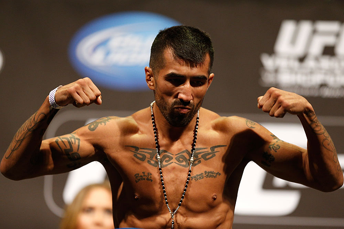 LAS VEGAS, NV - MAY 24:   Estevan Payan weighs in during the UFC 160 weigh-in at the MGM Grand Garden Arena on May 24, 2013 in Las Vegas, Nevada.  (Photo by Josh Hedges/Zuffa LLC/Zuffa LLC via Getty Images)