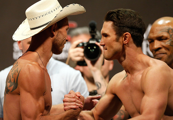 LAS VEGAS, NV - MAY 24:   (L-R) Opponents Donald "Cowboy" Cerrone and Karl "K.J." Noons shake hands during the UFC 160 weigh-in at the MGM Grand Garden Arena on May 24, 2013 in Las Vegas, Nevada.  (Photo by Josh Hedges/Zuffa LLC/Zuffa LLC via Getty Images)