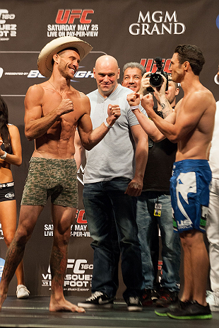 LAS VEGAS, NV - MAY 24:   (L-R) Opponents Donald "Cowboy" Cerrone and Karl "K.J." Noons face off during the UFC 160 weigh-in at the MGM Grand Garden Arena on May 24, 2013 in Las Vegas, Nevada.  (Photo by Jim Kemper/Zuffa LLC/Zuffa LLC via Getty Images)