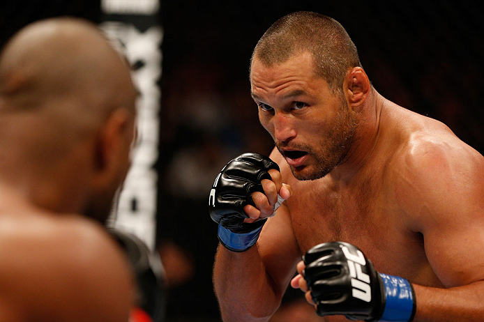 WINNIPEG, CANADA - JUNE 15:  (R-L) Dan Henderson squares off with Rashad Evans in their light heavyweight fight during the UFC 161 event at the MTS Centre on June 15, 2013 in Winnipeg, Manitoba, Canada.  (Photo by Josh Hedges/Zuffa LLC/Zuffa LLC via Getty Images)