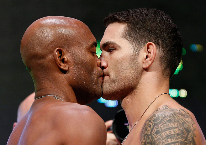 LAS VEGAS, NV - JULY 05:  (L-R) Opponents Anderson Silva and Chris Weidman face off during the UFC 162 weigh-in at the Mandalay Bay Events Center on July 5, 2013 in Las Vegas, Nevada.  (Photo by Josh Hedges/Zuffa LLC/Zuffa LLC via Getty Images)