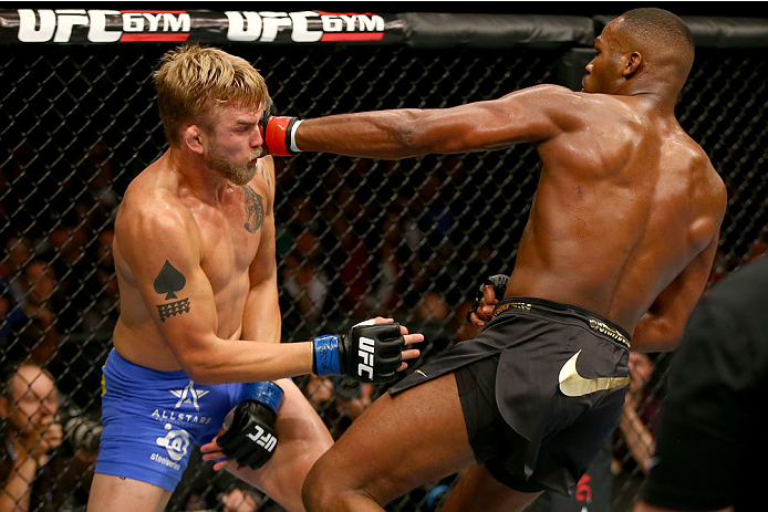 Jon 'Bones' Jones punches Alexander 'The Mauler' Gustafsson in their UFC light heavyweight championship bout at the Air Canada Center on September 21, 2013 in Toronto, ON, Canada. (Photo by Josh Hedges/Zuffa LLC)