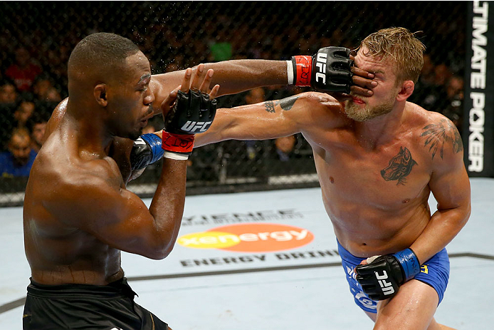 TORONTO, CANADA - SEPTEMBER 21:  (L-R) Jon 'Bones' Jones punches Alexander Gustafsson in their UFC light heavyweight championship bout at the Air Canada Center on September 21, 2013 in Toronto, Ontario, Canada. (Photo by Al Bello/Zuffa LLC/Zuffa LLC via Getty Images) *** Local Caption *** Jon Jones; Alexander Gustafsson