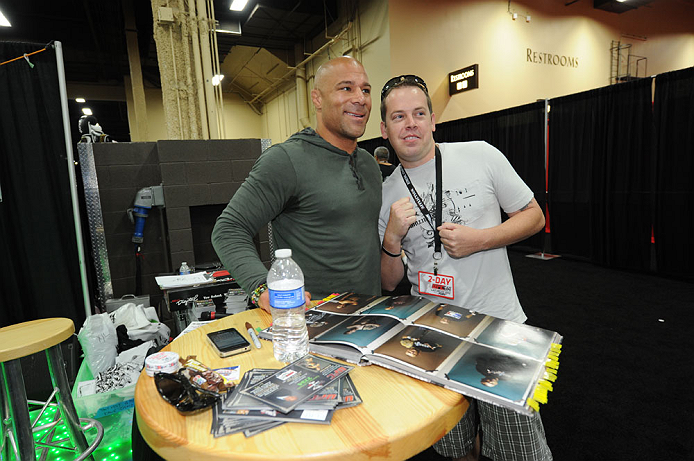 LAS VEGAS, NV - JULY 7:   Frank Trigg poses with fans during the UFC Fan Expo at the Mandalay Bay Convention Center on July 7, 2012 in Las Vegas, Nevada.  (Photo by Al Powers/Zuffa LLC/Zuffa LLC via Getty Images)  *** Local Caption ***