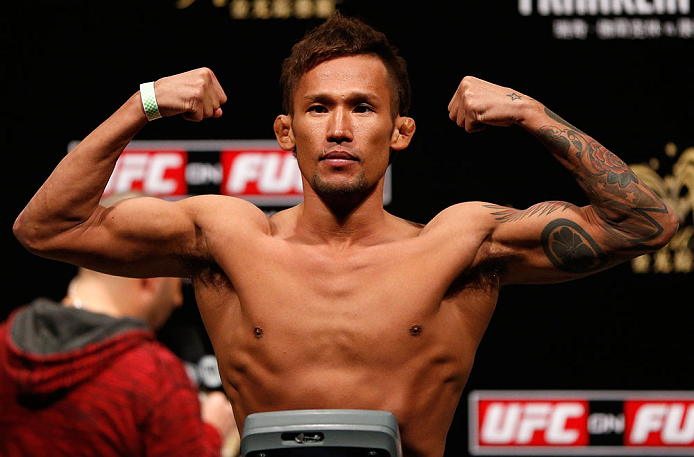 MACAU, MACAU - NOVEMBER 09:  Yasuhiro Urushitani makes weight during the UFC Macau weigh in at Cotai Arena on November 9, 2012 in Macau, Macau.  (Photo by Josh Hedges/Zuffa LLC/Zuffa LLC via Getty Images)