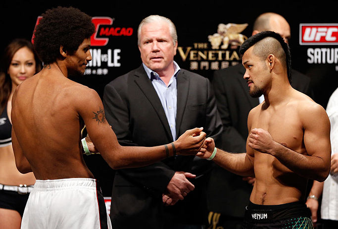 MACAU, MACAU - NOVEMBER 09:  (L-R) Opponents Alex Caceres and Motonobu Tezuka face off during the UFC Macau weigh in at Cotai Arena on November 9, 2012 in Macau, Macau.  (Photo by Josh Hedges/Zuffa LLC/Zuffa LLC via Getty Images)