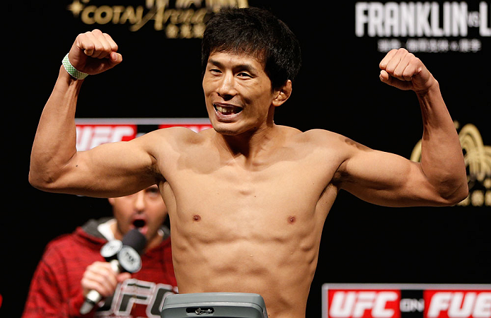MACAU, MACAU - NOVEMBER 09:  Takeya Mizugaki makes weight during the UFC Macau weigh in at Cotai Arena on November 9, 2012 in Macau, Macau.  (Photo by Josh Hedges/Zuffa LLC/Zuffa LLC via Getty Images)