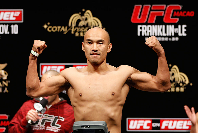 MACAU, MACAU - NOVEMBER 09:  Tiequan Zhang makes weight during the UFC Macau weigh in at Cotai Arena on November 9, 2012 in Macau, Macau.  (Photo by Josh Hedges/Zuffa LLC/Zuffa LLC via Getty Images)