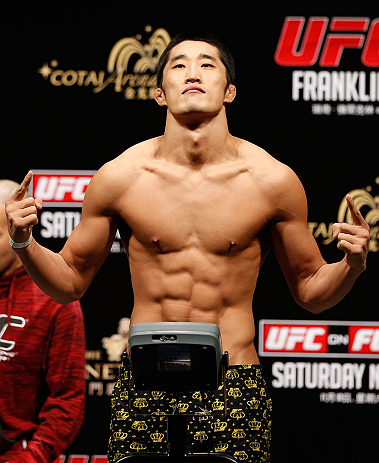 MACAU, MACAU - NOVEMBER 09:  Dong Hyun Kim makes weight during the UFC Macau weigh in at Cotai Arena on November 9, 2012 in Macau, Macau.  (Photo by Josh Hedges/Zuffa LLC/Zuffa LLC via Getty Images)