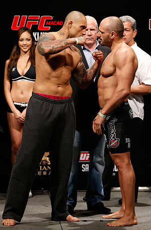 MACAU, MACAU - NOVEMBER 09:  (L-R) Opponents Thiago Silva and Stanislav Nedkov face off during the UFC Macau weigh in at Cotai Arena on November 9, 2012 in Macau, Macau.  (Photo by Josh Hedges/Zuffa LLC/Zuffa LLC via Getty Images)