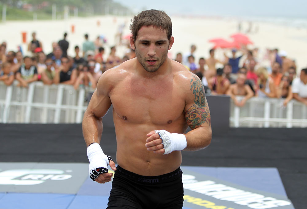 RIO DE JANEIRO, BRAZIL - JANUARY 11:  Chad Mendes works out for the media and fans during the UFC 142 Open Workouts at Barra de Tijuca Beach on January 11, 2012 in Rio de Janeiro, Brazil.  (Photo by Josh Hedges/Zuffa LLC/Zuffa LLC via Getty Images)