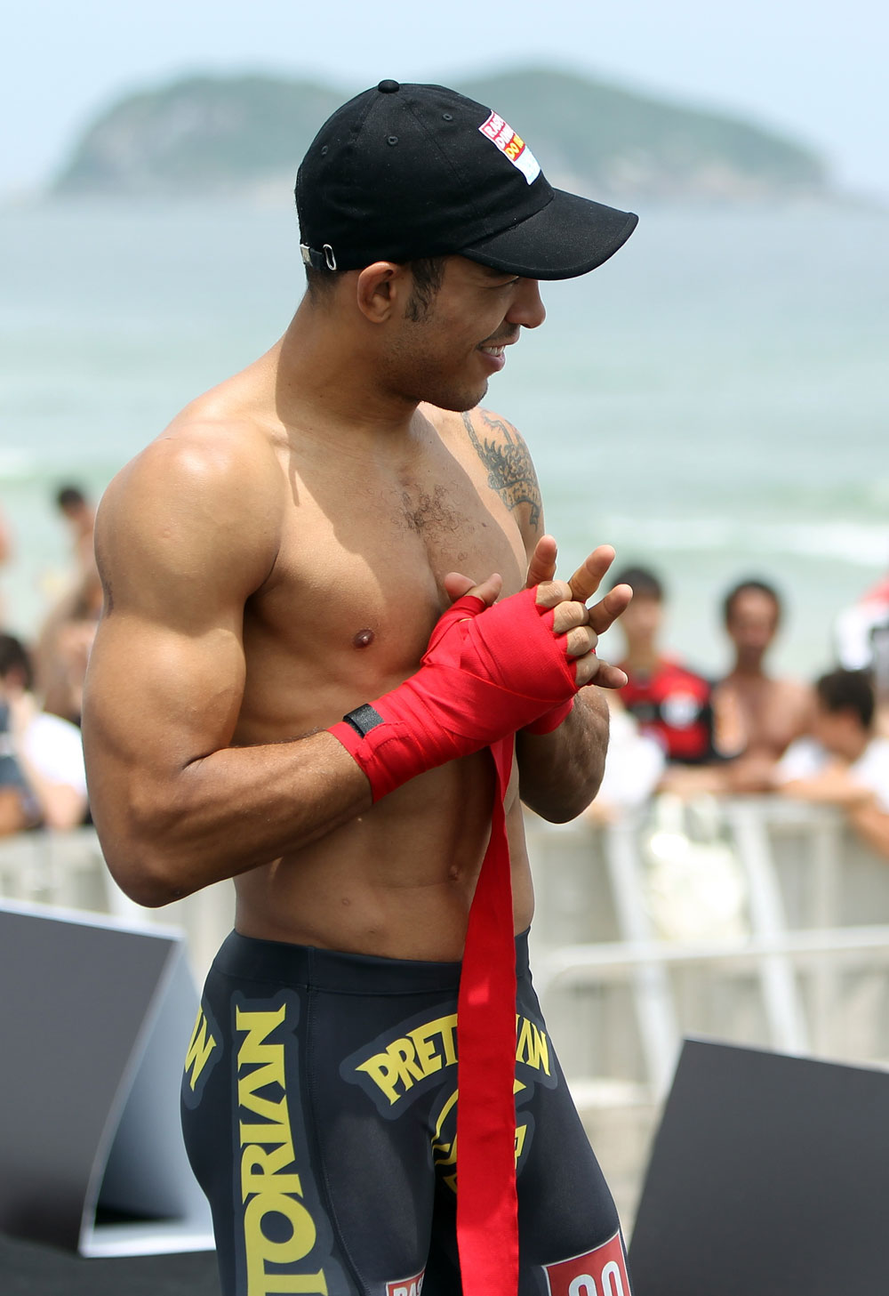 RIO DE JANEIRO, BRAZIL - JANUARY 11:  Jose Aldo works out for the media and fans during the UFC 142 Open Workouts at Barra de Tijuca Beach on January 11, 2012 in Rio de Janeiro, Brazil.  (Photo by Josh Hedges/Zuffa LLC/Zuffa LLC via Getty Images)