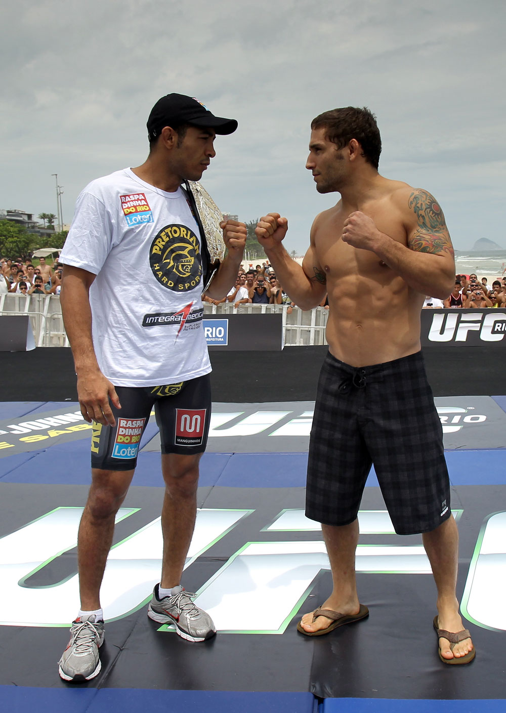 RIO DE JANEIRO, BRAZIL - JANUARY 11:  (L-R) UFC Featherweight Champion Jose Aldo and challenger Chad Mendes face off during the UFC 142 Open Workouts at Barra de Tijuca Beach on January 11, 2012 in Rio de Janeiro, Brazil.  (Photo by Josh Hedges/Zuffa LLC/Zuffa LLC via Getty Images)