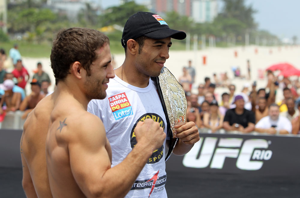 RIO DE JANEIRO, BRAZIL - JANUARY 11:  (R-L) UFC Featherweight Champion Jose Aldo and challenger Chad Mendes pose for photos during the UFC 142 Open Workouts at Barra de Tijuca Beach on January 11, 2012 in Rio de Janeiro, Brazil.  (Photo by Josh Hedges/Zuffa LLC/Zuffa LLC via Getty Images)