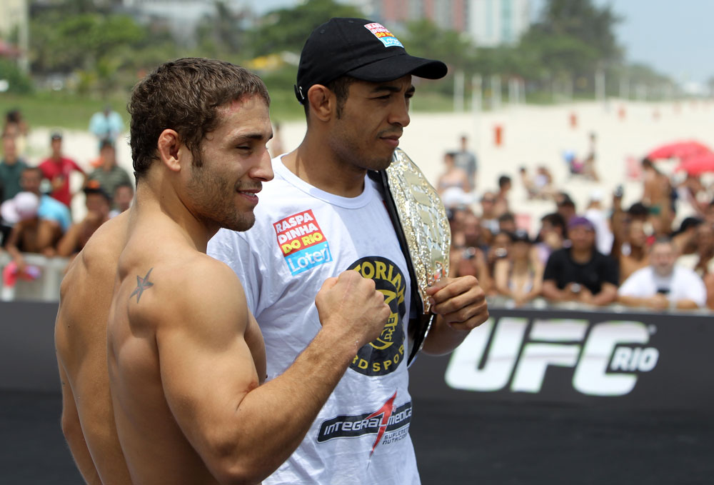RIO DE JANEIRO, BRAZIL - JANUARY 11:  (R-L) UFC Featherweight Champion Jose Aldo and challenger Chad Mendes pose for photos during the UFC 142 Open Workouts at Barra de Tijuca Beach on January 11, 2012 in Rio de Janeiro, Brazil.  (Photo by Josh Hedges/Zuffa LLC/Zuffa LLC via Getty Images)
