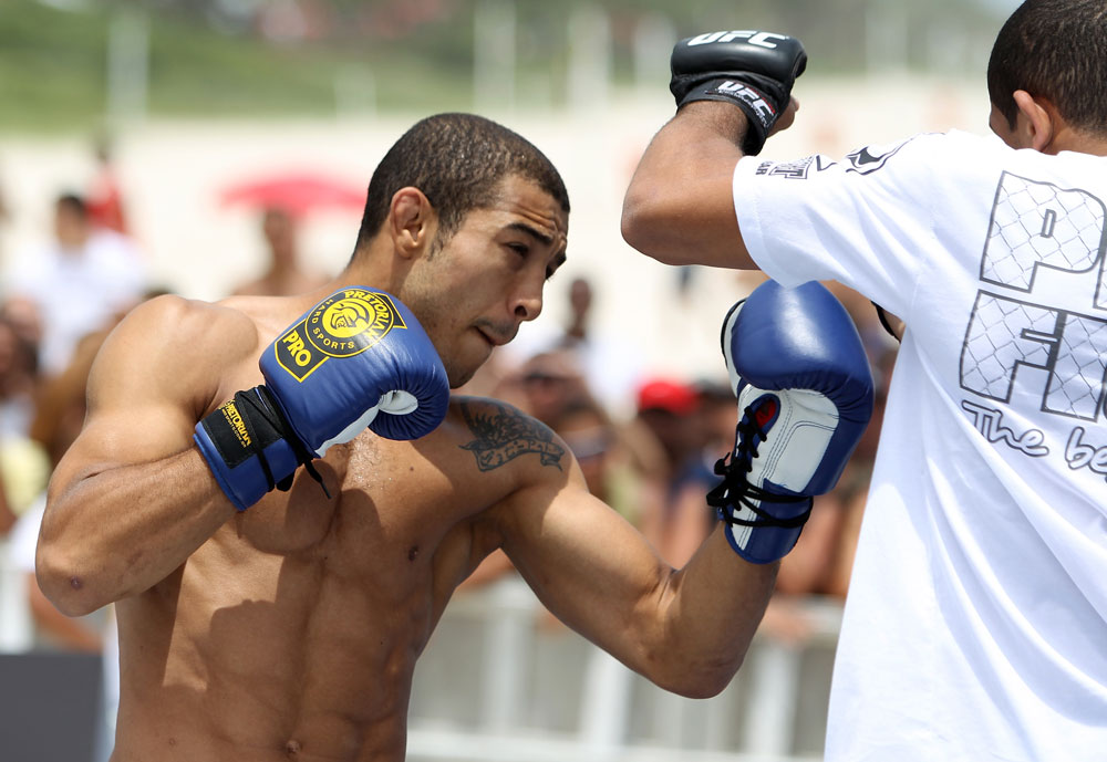 RIO DE JANEIRO, BRAZIL - JANUARY 11:  Jose Aldo works out for the media and fans during the UFC 142 Open Workouts at Barra de Tijuca Beach on January 11, 2012 in Rio de Janeiro, Brazil.  (Photo by Josh Hedges/Zuffa LLC/Zuffa LLC via Getty Images)