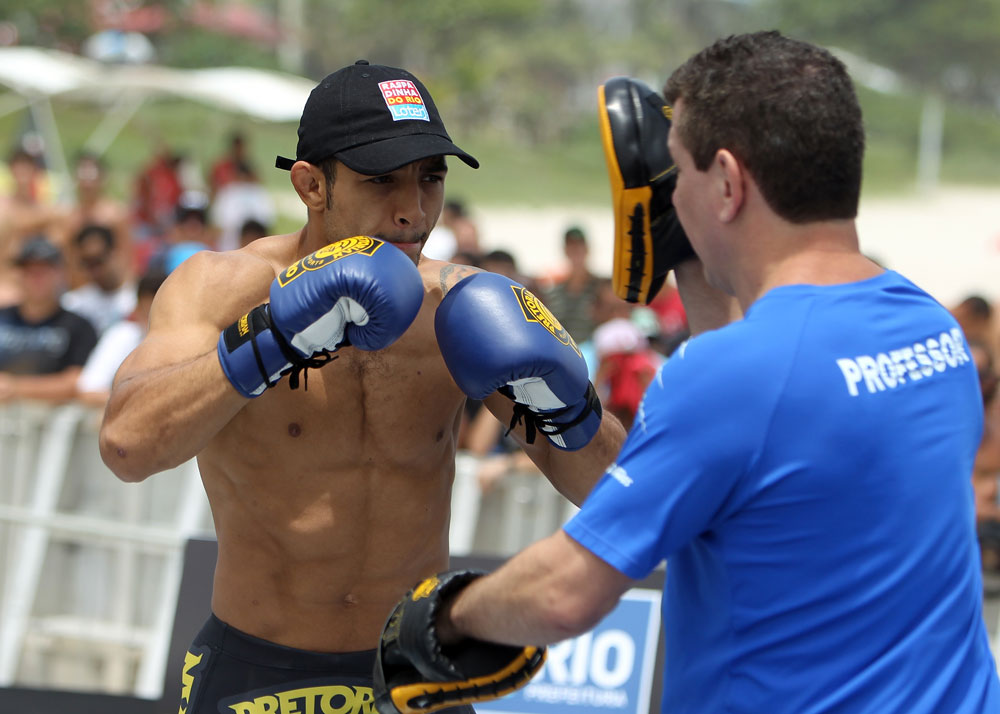 RIO DE JANEIRO, BRAZIL - JANUARY 11:  Jose Aldo works out for the media and fans during the UFC 142 Open Workouts at Barra de Tijuca Beach on January 11, 2012 in Rio de Janeiro, Brazil.  (Photo by Josh Hedges/Zuffa LLC/Zuffa LLC via Getty Images)