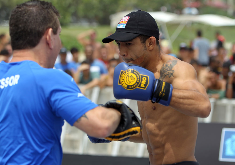 RIO DE JANEIRO, BRAZIL - JANUARY 11:  Jose Aldo works out for the media and fans during the UFC 142 Open Workouts at Barra de Tijuca Beach on January 11, 2012 in Rio de Janeiro, Brazil.  (Photo by Josh Hedges/Zuffa LLC/Zuffa LLC via Getty Images)