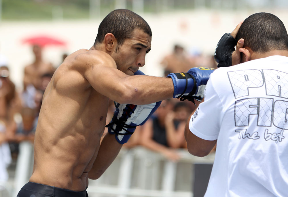 RIO DE JANEIRO, BRAZIL - JANUARY 11:  Jose Aldo works out for the media and fans during the UFC 142 Open Workouts at Barra de Tijuca Beach on January 11, 2012 in Rio de Janeiro, Brazil.  (Photo by Josh Hedges/Zuffa LLC/Zuffa LLC via Getty Images)
