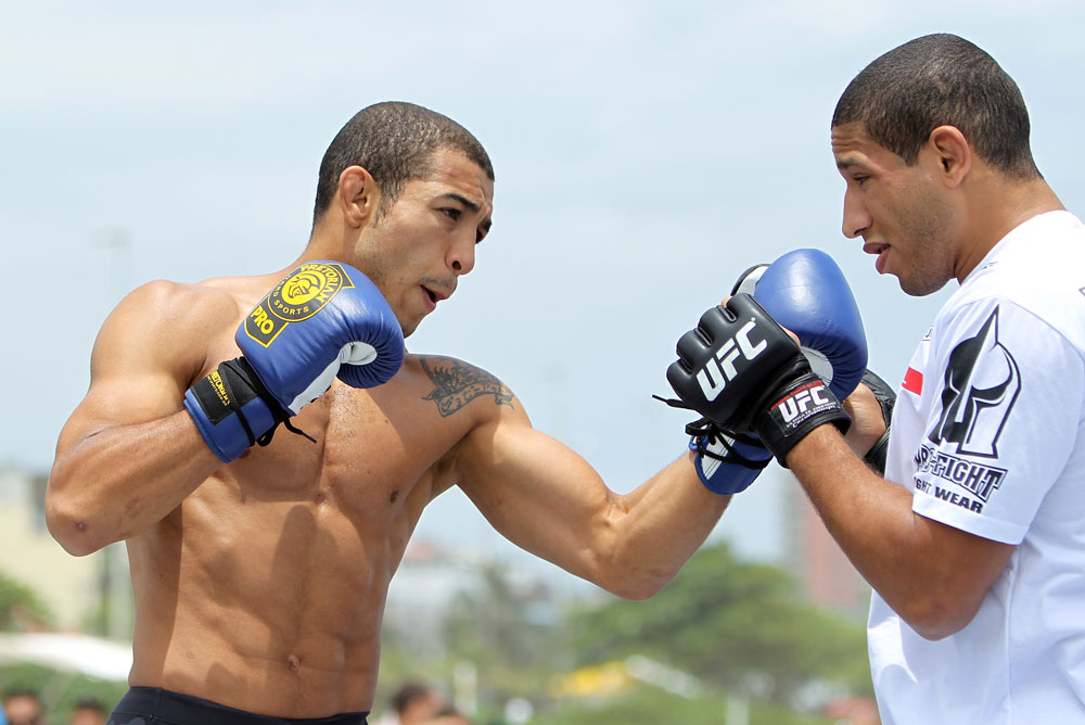 RIO DE JANEIRO, BRAZIL - JANUARY 11:  Jose Aldo works out for the media and fans during the UFC 142 Open Workouts at Barra de Tijuca Beach on January 11, 2012 in Rio de Janeiro, Brazil.  (Photo by Josh Hedges/Zuffa LLC/Zuffa LLC via Getty Images)