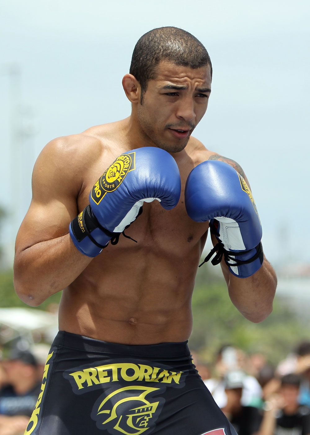 RIO DE JANEIRO, BRAZIL - JANUARY 11:  Jose Aldo works out for the media and fans during the UFC 142 Open Workouts at Barra de Tijuca Beach on January 11, 2012 in Rio de Janeiro, Brazil.  (Photo by Josh Hedges/Zuffa LLC/Zuffa LLC via Getty Images)