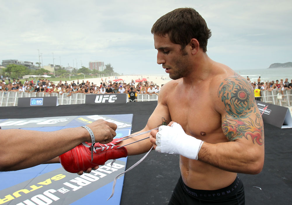 RIO DE JANEIRO, BRAZIL - JANUARY 11:  Chad Mendes works out for the media and fans during the UFC 142 Open Workouts at Barra de Tijuca Beach on January 11, 2012 in Rio de Janeiro, Brazil.  (Photo by Josh Hedges/Zuffa LLC/Zuffa LLC via Getty Images)