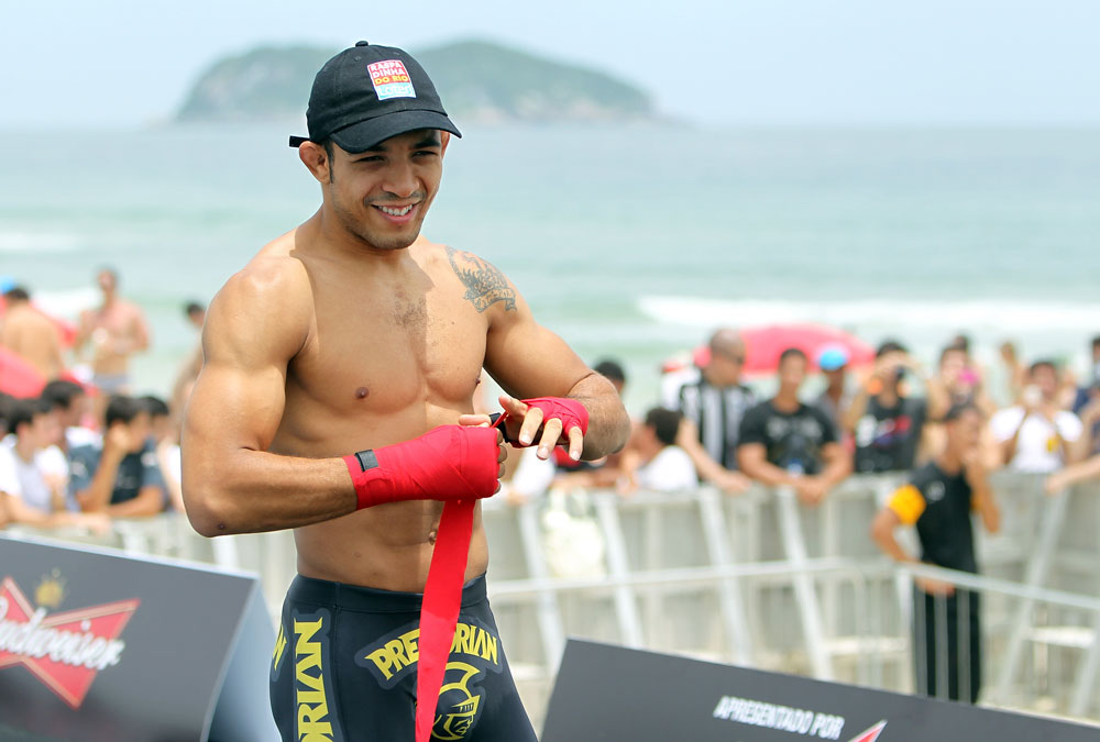 RIO DE JANEIRO, BRAZIL - JANUARY 11:  Jose Aldo works out for the media and fans during the UFC 142 Open Workouts at Barra de Tijuca Beach on January 11, 2012 in Rio de Janeiro, Brazil.  (Photo by Josh Hedges/Zuffa LLC/Zuffa LLC via Getty Images)