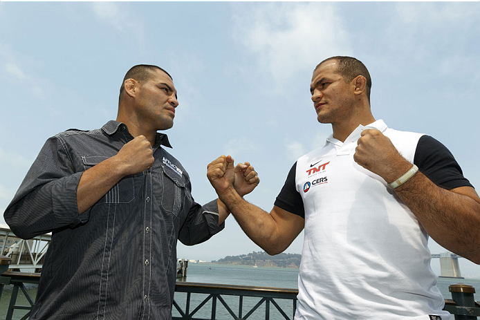 SAN FRANCISCO, CA - JULY 29: Cain Velasquez (L) and Junior dos Santos (R) square off during a UFC press tour event on July 29, 2013 in San Francisco, California.  (Photo by Jason O. Watson/Zuffa LLC/Zuffa LLC via Getty Images)