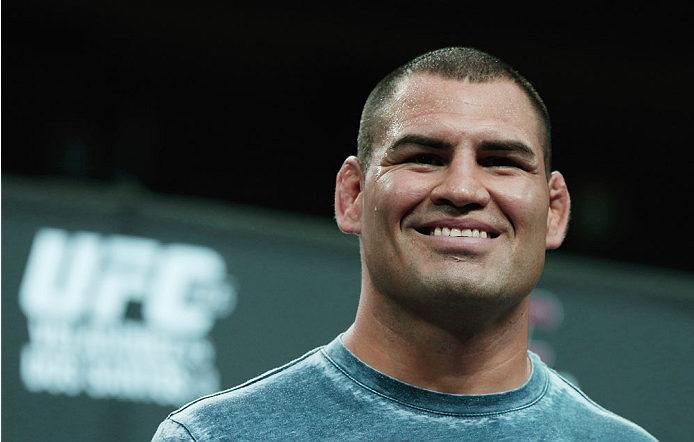HOUSTON, TX - AUGUST 01:  UFC fighter Cain Velasquez speaks with media and fans during an open workout at the Toyota Center to promote his October 19, title fight with Junior dos Santos on August 1, 2013 in Houston, Texas.  (Photo by Scott Halleran/Zuffa LLC/Zuffa LLC via Getty Images)