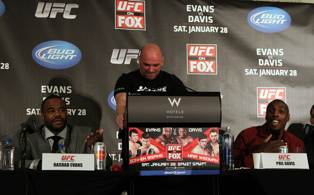 CHICAGO, IL - JANUARY 26: Light Heavyweight opponents Rashad Evans (L) and Phil Davis (R) argue with each other during the UFC on FOX press conference at the W Hotel on January 26, 2012 in Chicago, Illinois. (Photo by Josh Hedges/Zuffa LLC/Zuffa LLC via Getty Images) *** Local Caption *** Rashad Evans; Phil Davis; Dana White