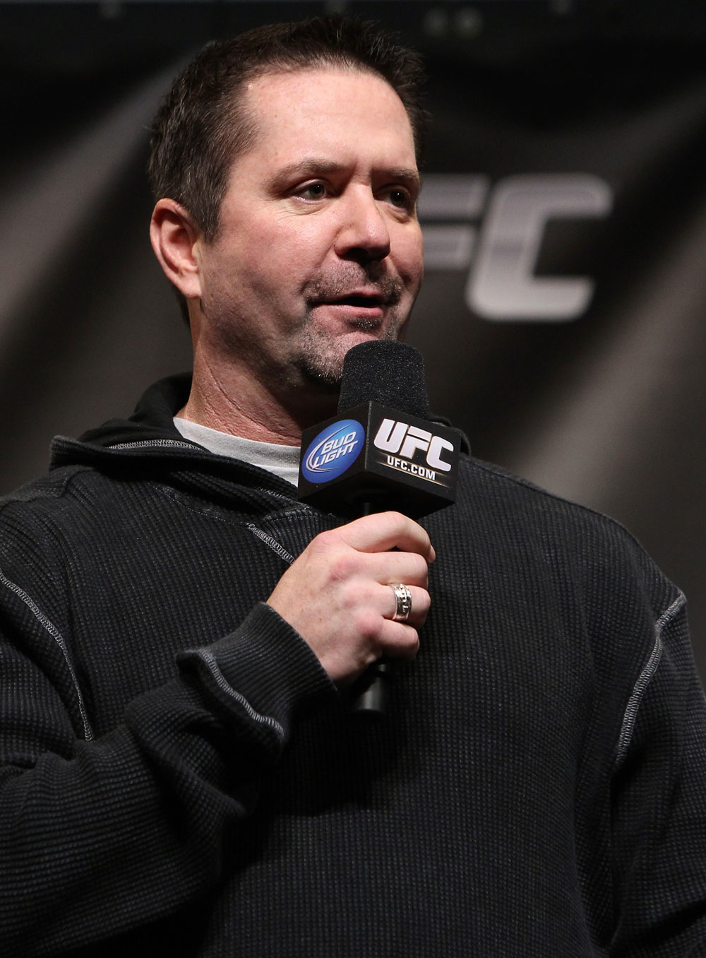 CHICAGO, IL - JANUARY 27: UFC commentator Mike Goldberg interacts with fans during a Q&A session before the UFC on FOX official weigh in at the Chicago Theatre on January 27, 2012 in Chicago, Illinois. (Photo by Josh Hedges/Zuffa LLC/Zuffa LLC via Getty Images) *** Local Caption *** Mike Goldberg