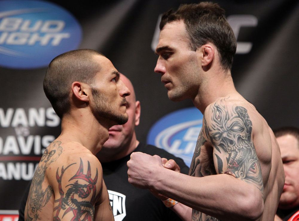 CHICAGO, IL - JANUARY 27: (L-R) Featherweight opponents Cub Swanson and George Roop face off after weighing in during the UFC on FOX official weigh in at the Chicago Theatre on January 27, 2012 in Chicago, Illinois. (Photo by Josh Hedges/Zuffa LLC/Zuffa LLC via Getty Images) *** Local Caption *** George Roop; Cub Swanson