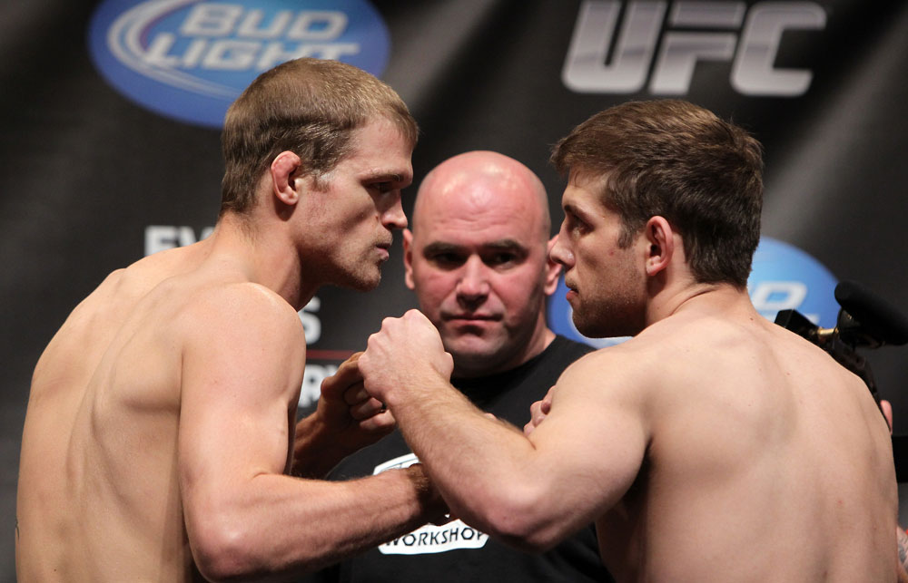 CHICAGO, IL - JANUARY 27: (L-R) Lightweight opponents Evan Dunham and Nik Lentz face off after weighing in during the UFC on FOX official weigh in at the Chicago Theatre on January 27, 2012 in Chicago, Illinois. (Photo by Josh Hedges/Zuffa LLC/Zuffa LLC via Getty Images) *** Local Caption *** Nik Lentz; Evan Dunham; Dana White