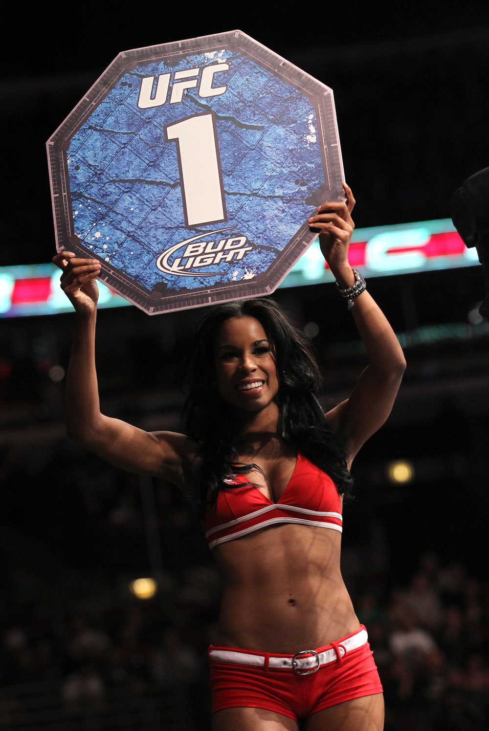 CHICAGO, IL - JANUARY 28:  UFC Octagon Girl Chandella Powell introduces round 1 before the Johnson vs Roller bout during the UFC on FOX event at United Center on January 28, 2012 in Chicago, Illinois.  (Photo by Nick Laham/Zuffa LLC/Zuffa LLC via Getty Images) *** Local Caption *** Chandella Powell