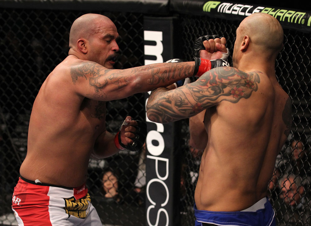 CHICAGO, IL - JANUARY 28:  (L-R) Joey Beltran punches Lavar Johnson during the UFC on FOX event at United Center on January 28, 2012 in Chicago, Illinois.  (Photo by Nick Laham/Zuffa LLC/Zuffa LLC via Getty Images) *** Local Caption *** Lavar Johnson; Joey Beltran