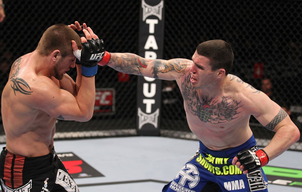 CHICAGO, IL - JANUARY 28:  (R-L) Chris Camozzi punches Dustin Jacoby during the UFC on FOX event at United Center on January 28, 2012 in Chicago, Illinois.  (Photo by Nick Laham/Zuffa LLC/Zuffa LLC via Getty Images) *** Local Caption *** Chris Camozzi; Dustin Jacoby