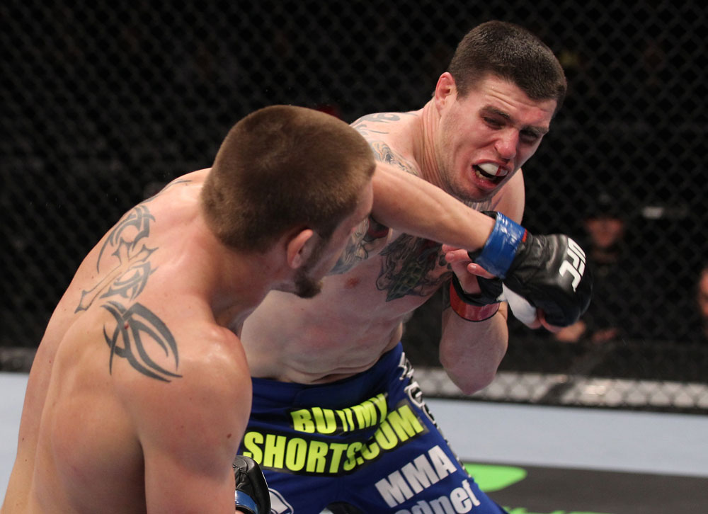 CHICAGO, IL - JANUARY 28:  (L-R) Dustin Jacoby and Chris Camozzi trade punches during the UFC on FOX event at United Center on January 28, 2012 in Chicago, Illinois.  (Photo by Nick Laham/Zuffa LLC/Zuffa LLC via Getty Images) *** Local Caption *** Chris Camozzi; Dustin Jacoby