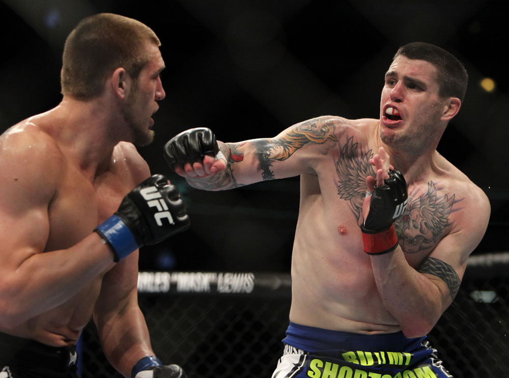 Chris Camozzi punches <a href='../fighter/Dustin-Jacoby'><a href='../fighter/Dustin-Jacoby'>Dustin Jacoby</a></a> during the UFC on FOX event at United Center on January 28, 2012 in Chicago, Illinois. (Photo by Nick Laham/Zuffa LLC)
