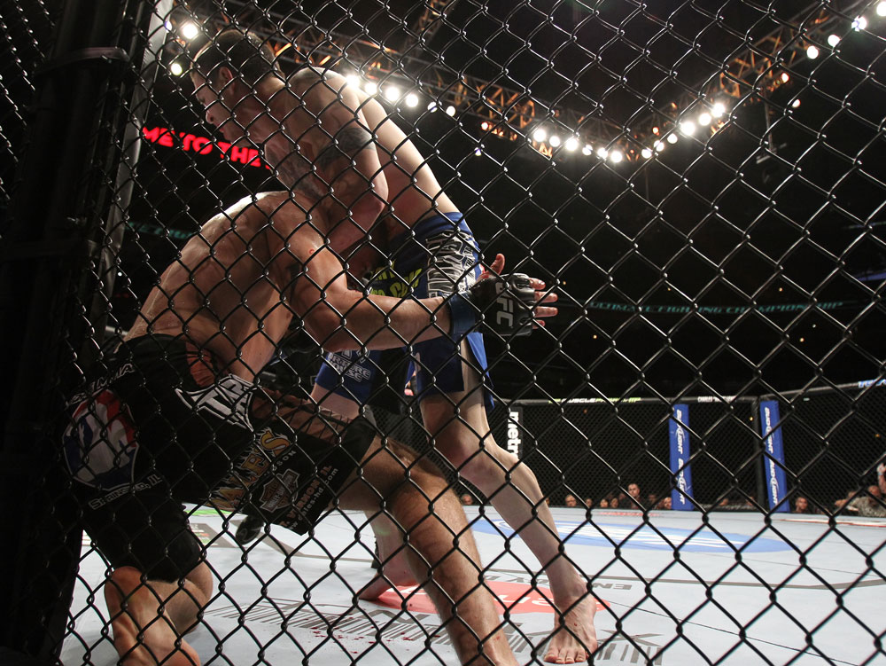 CHICAGO, IL - JANUARY 28:  (R-L) Chris Camozzi defeats Dustin Jacoby with a guillotine choke submission during the UFC on FOX event at United Center on January 28, 2012 in Chicago, Illinois.  (Photo by Josh Hedges/Zuffa LLC/Zuffa LLC via Getty Images) *** Local Caption *** Chris Camozzi; Dustin Jacoby