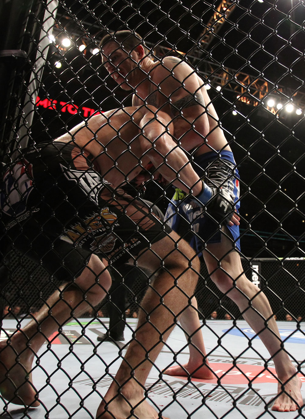 CHICAGO, IL - JANUARY 28:  (R-L) Chris Camozzi defeats Dustin Jacoby with a guillotine choke submission during the UFC on FOX event at United Center on January 28, 2012 in Chicago, Illinois.  (Photo by Josh Hedges/Zuffa LLC/Zuffa LLC via Getty Images) *** Local Caption *** Chris Camozzi; Dustin Jacoby