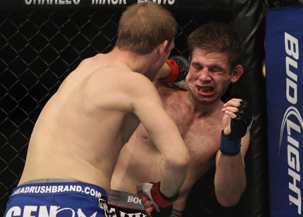 CHICAGO, IL - JANUARY 28:  (L-R) Evan Dunham punches Nik Lentz during the UFC on FOX event at United Center on January 28, 2012 in Chicago, Illinois.  (Photo by Josh Hedges/Zuffa LLC/Zuffa LLC via Getty Images) *** Local Caption *** Nik Lentz; Evan Dunham