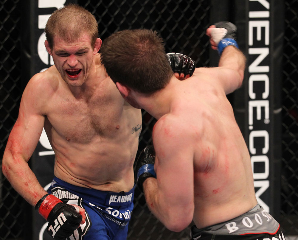 CHICAGO, IL - JANUARY 28:  (L-R) Evan Dunham punches Nik Lentz during the UFC on FOX event at United Center on January 28, 2012 in Chicago, Illinois.  (Photo by Nick Laham/Zuffa LLC/Zuffa LLC via Getty Images) *** Local Caption *** Nik Lentz; Evan Dunham